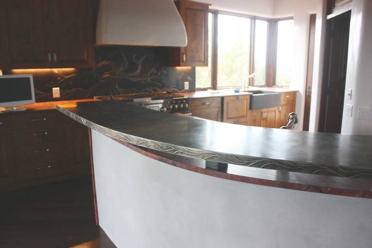 In the foreground is the zinc counter top with an embossed edging.